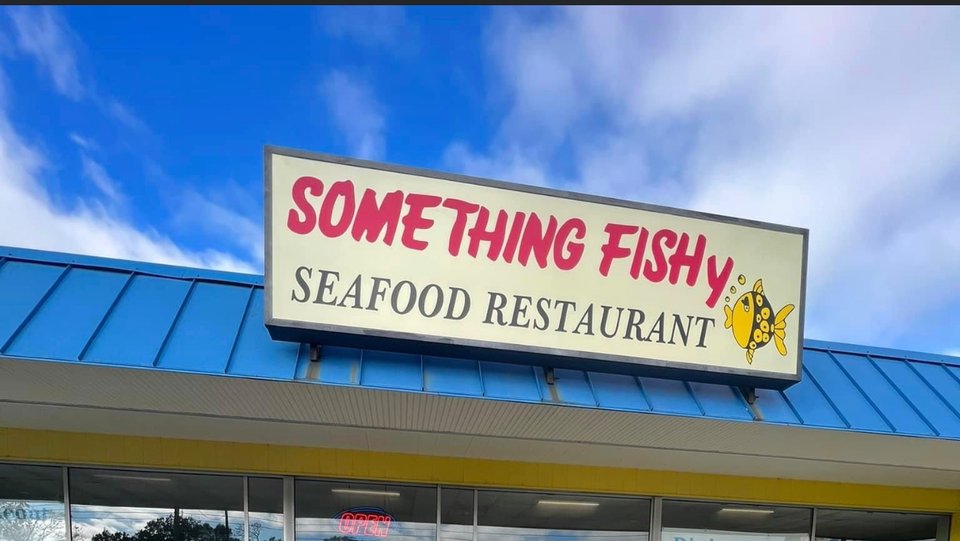 Seafood platters on a casual restaurant table.